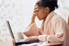 Frustrated Woman Using Laptop
